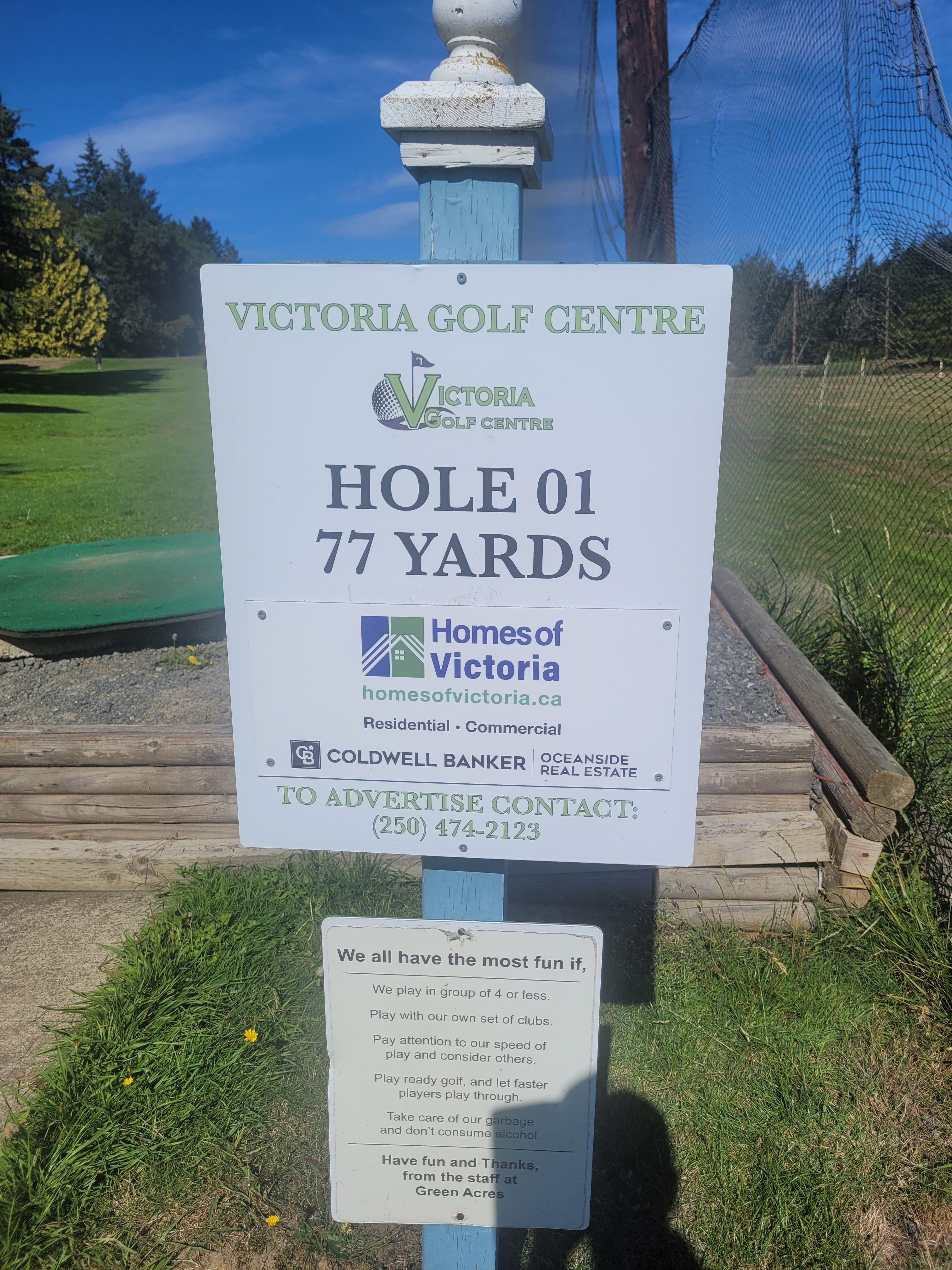 advertising 2 on the hole 1 yardage sign